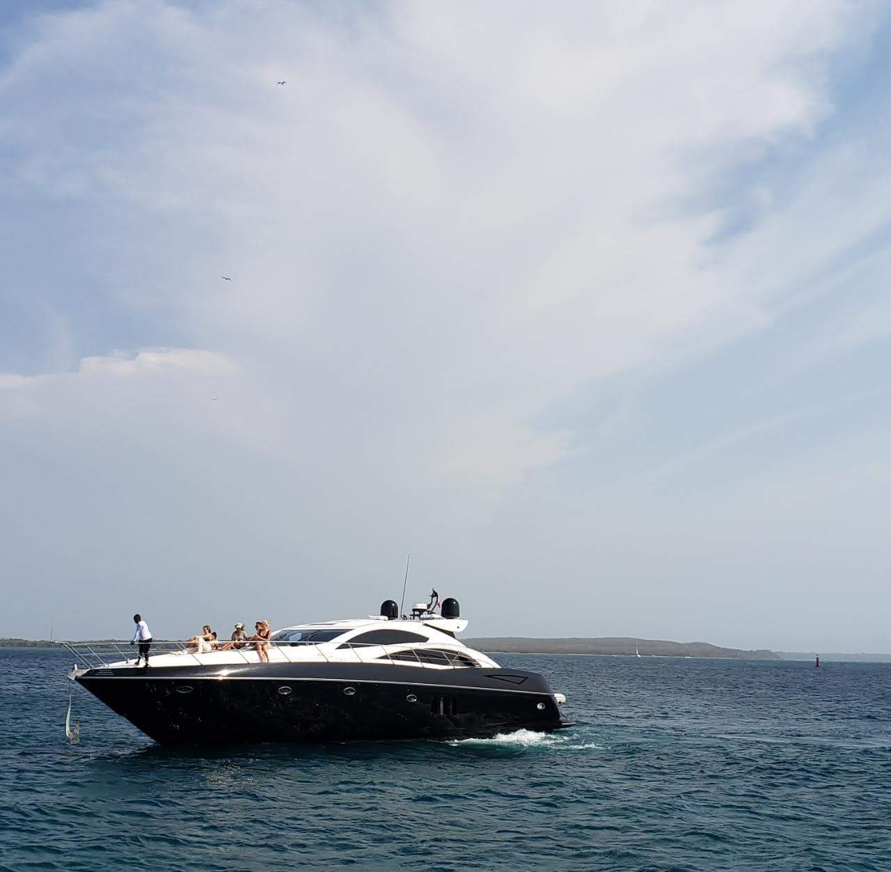 Sunseeker 72 black hull — luxury charter yacht Cartagena