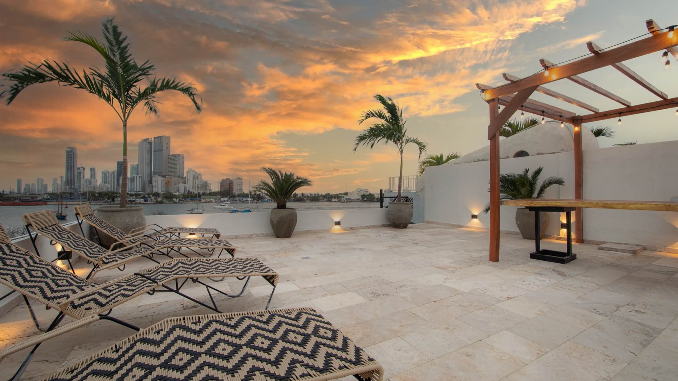 Casa Arsenal rooftop pool at night